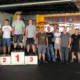 Die Auszubildenden der Hentschke Bau GmbH beim 1. Azubi-Feedback-Tag. Geehrt wurden die schnellsten Kartfahrer, Spaß hatten aber alle Teilnehmer.