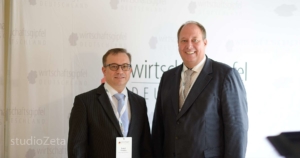 Marcel Riwalsky mit Kanzleramtsminister Helge Braun beim Wirtschaftsgipfel Deutschland 2019